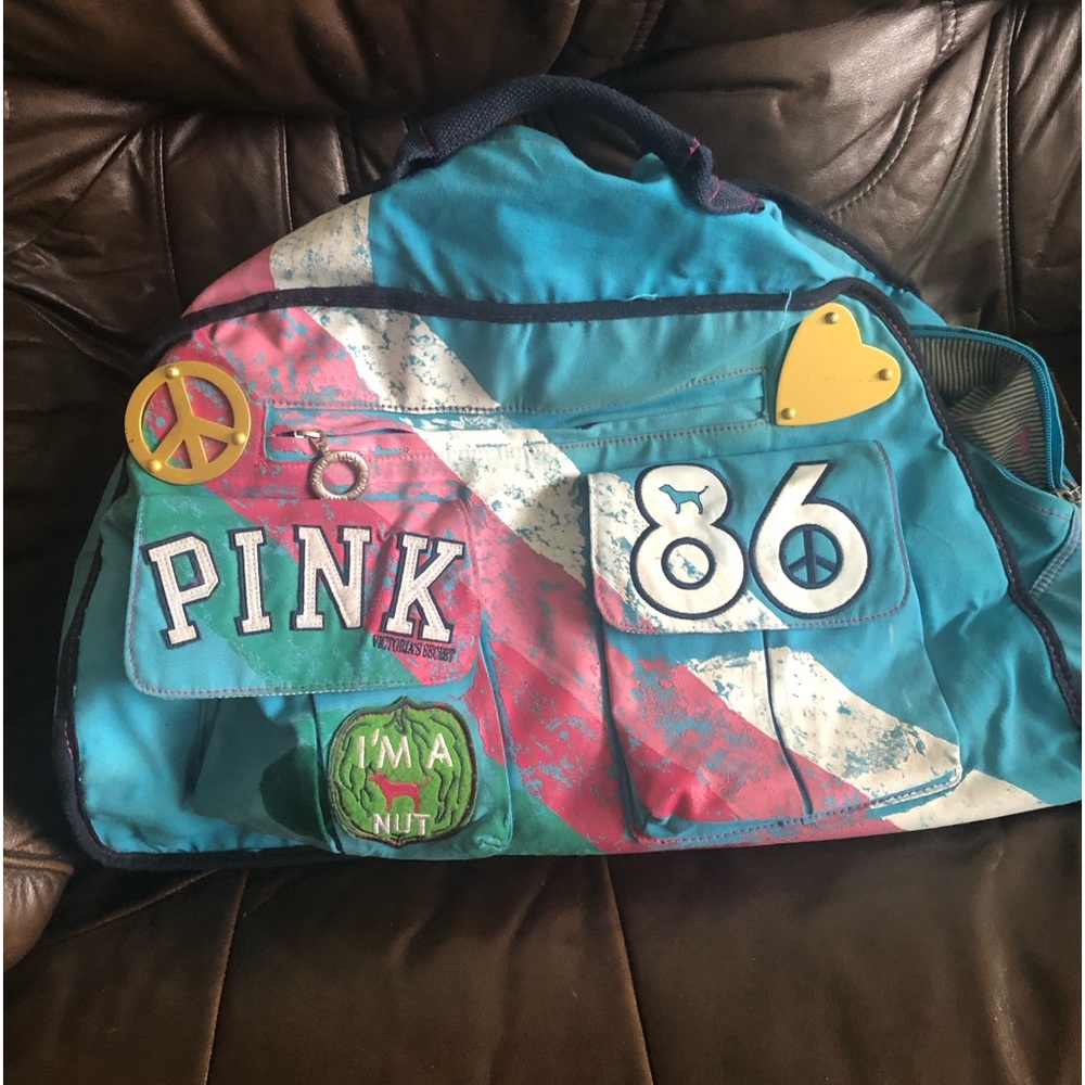 PINK Vintage Rare Victoria’s Secret rolling luggage blue bag.